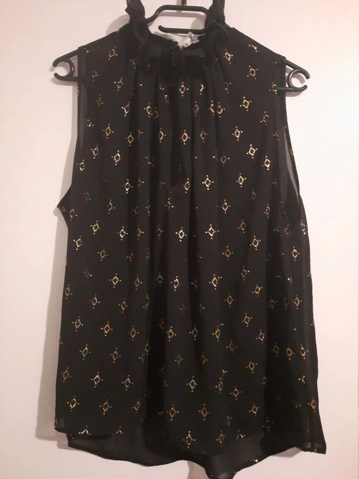 Blouse noir et doré