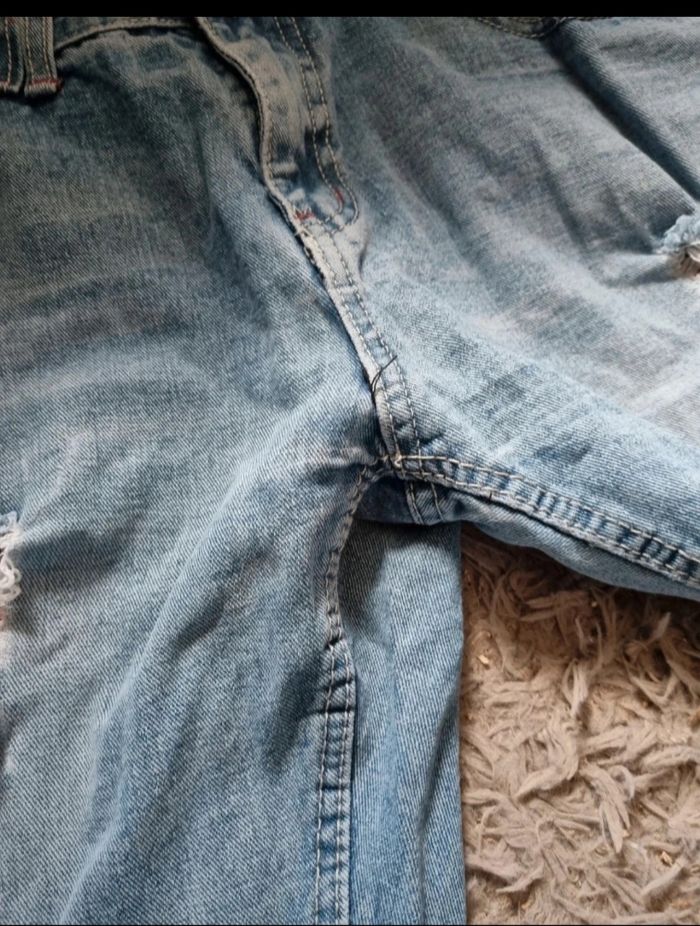 Jeans à trous taille 44 mixte - photo numéro 7