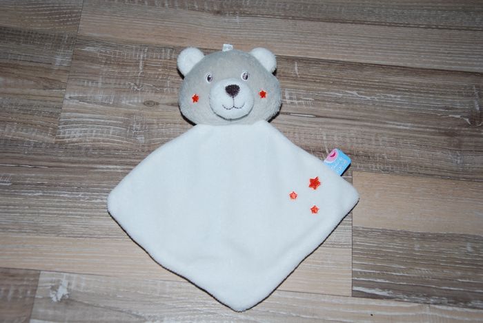 Doudou sucre d'orge ours plat gris étoiles oranges