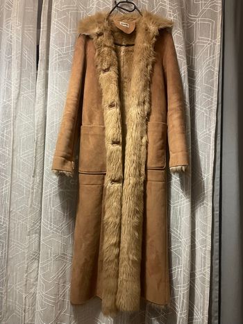 Manteau long fausse fourrure