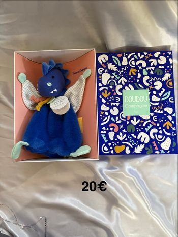Doudou dinosaure bleu