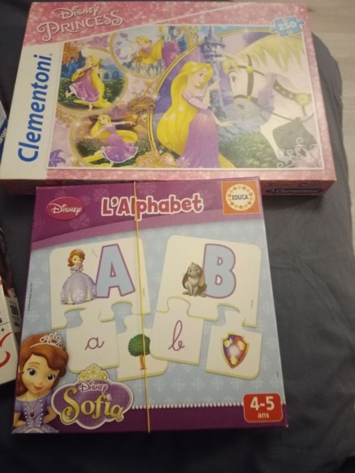 Lot de 4 boîtes de puzzles