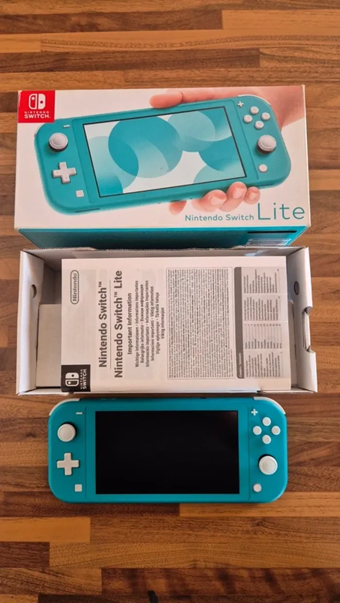 Console Nintendo switch lite "Bleu turquoise " en boîte - photo numéro 3