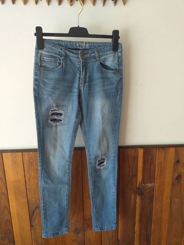 Jeans bleu effet troué