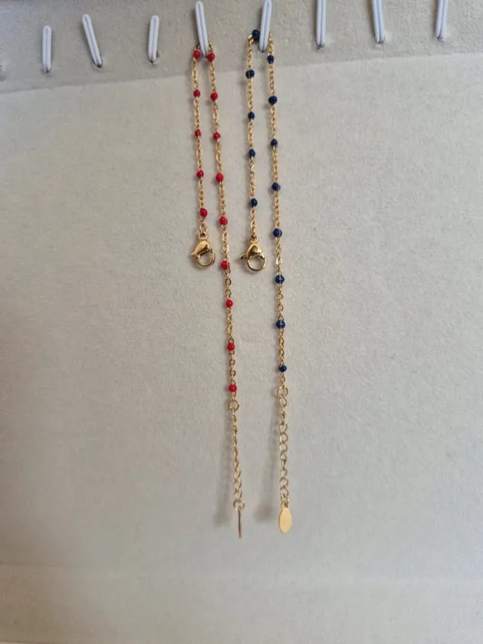 Lot de 2 bracelets 17cm à 20 cm dorée style gigi
en acier inoxydable : 1 rouge + 1 bleu marine - photo numéro 2