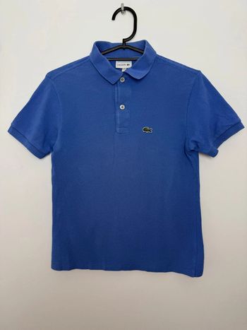 Polo Lacoste garçon 12 ans bleu parfait état