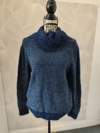 Pull col montant