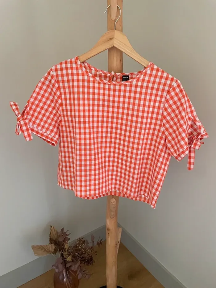 Blouse à carreaux orange