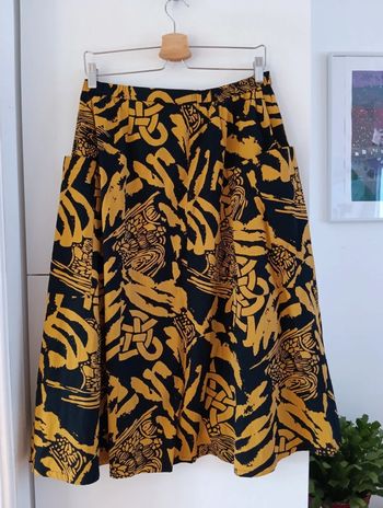 Jupe vintage en coton noir imprimé moutarde longueur midi