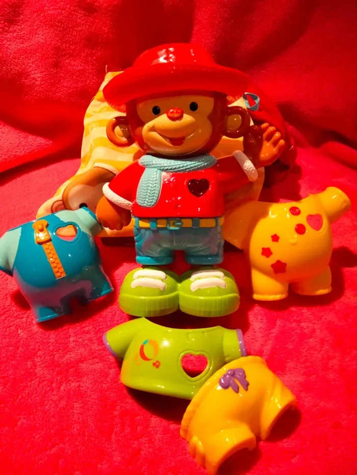 Singe Noé apprend à s'habiller - photo numéro 3