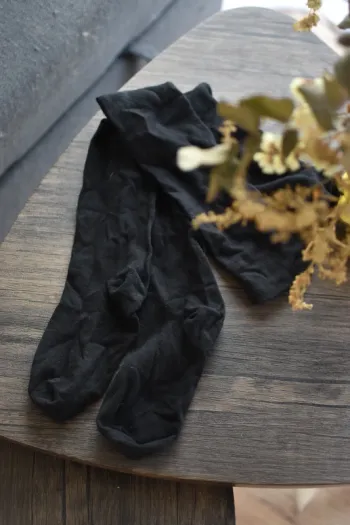 Chaussettes noires hautes