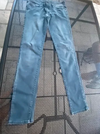 Jean gris Levis Slight curve mid ruse skinny w27 L32