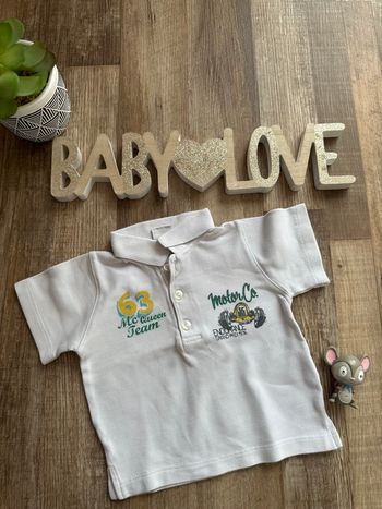 - Polo Stummer    - 9 mois - Très bon état 