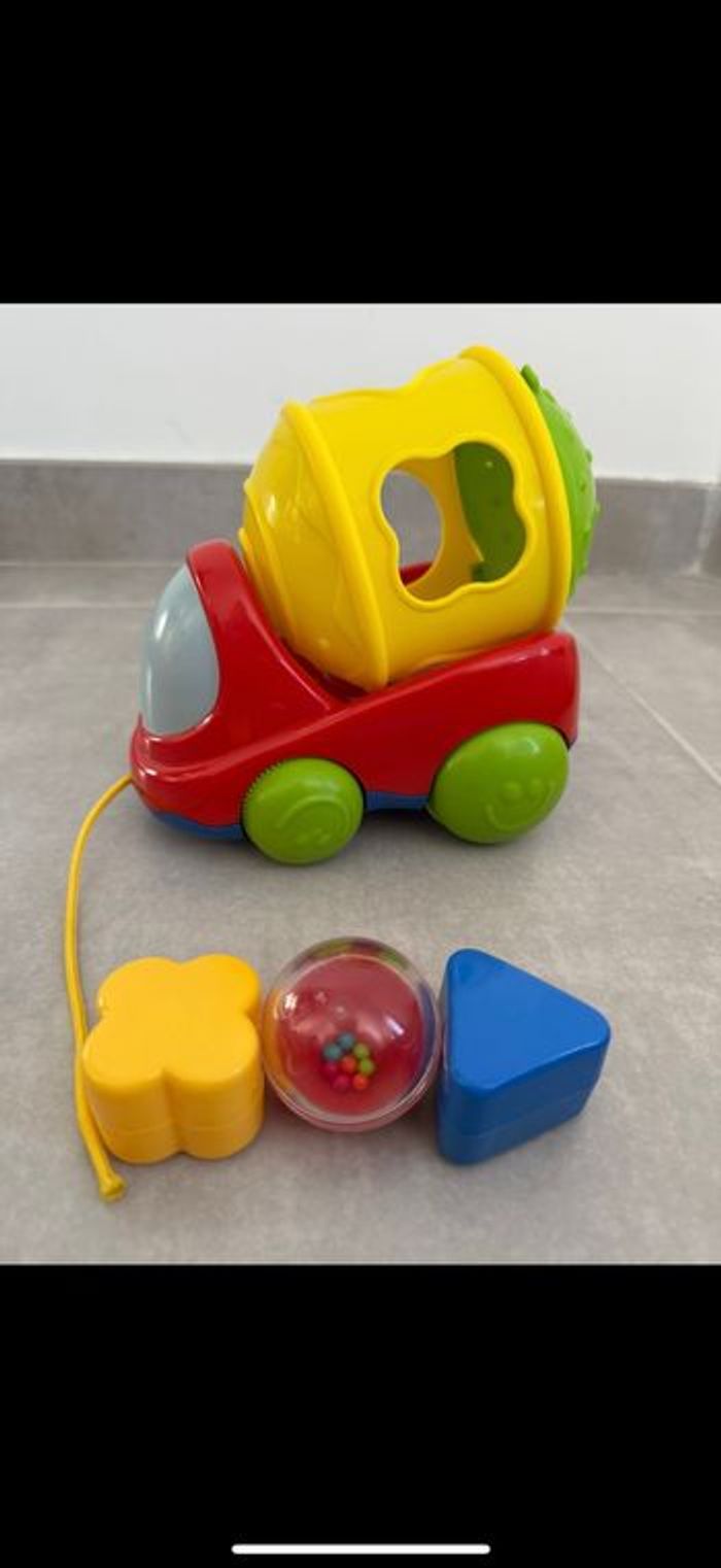 Jouet camion toupie avec formes 1er âge