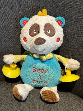 Peluche bébé à bord