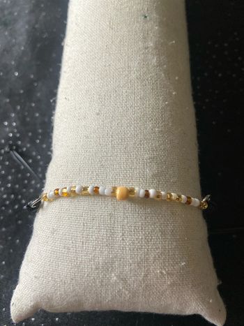 Bracelet beige doré 2025