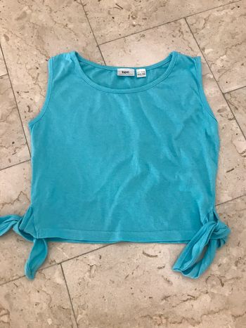 Teeshirt turquoise sans manche 10 Ans