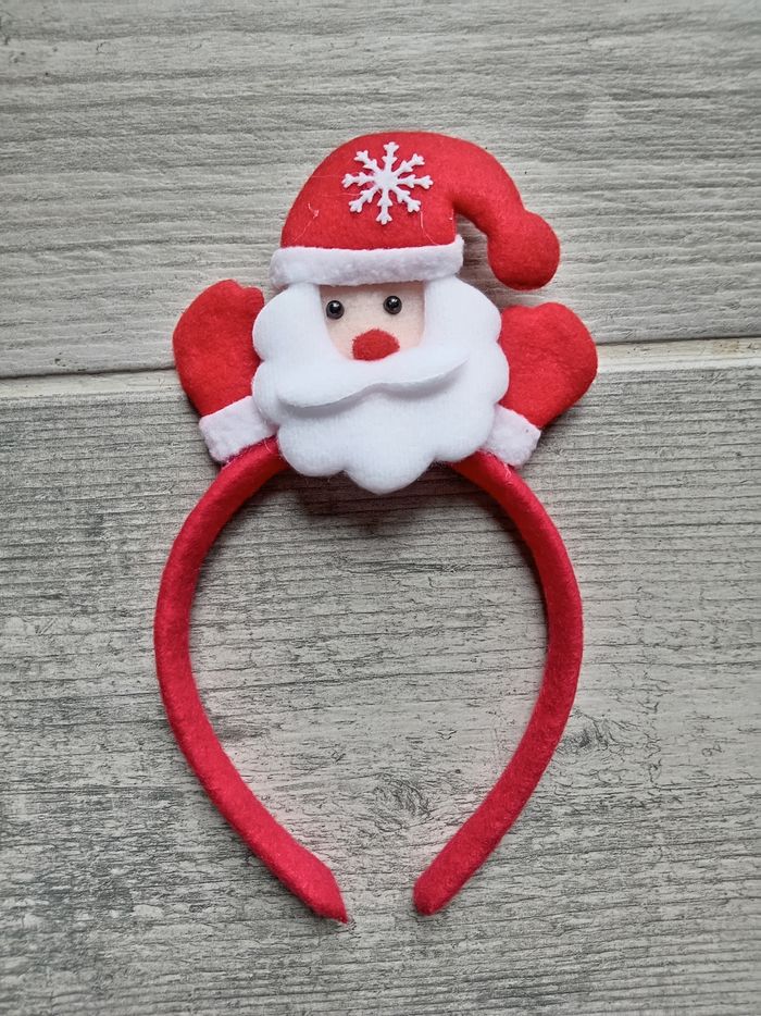 Serre tête pere Noël