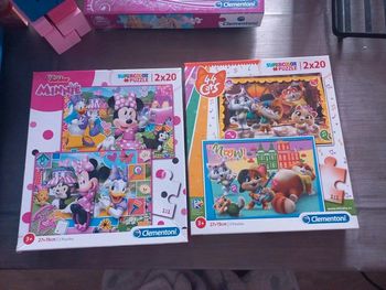 2 boîtes de 2 puzzles