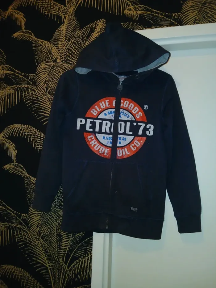 🩶 Gilet à capuche taille 10 ans.