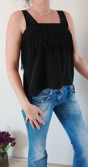 Joli top noir à franges vintage