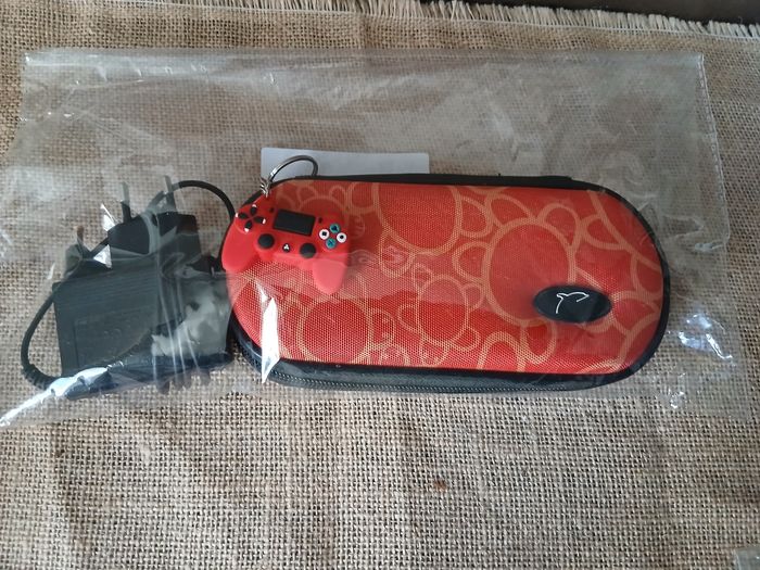 PSP E1004 avec chargeur et housse - photo numéro 6