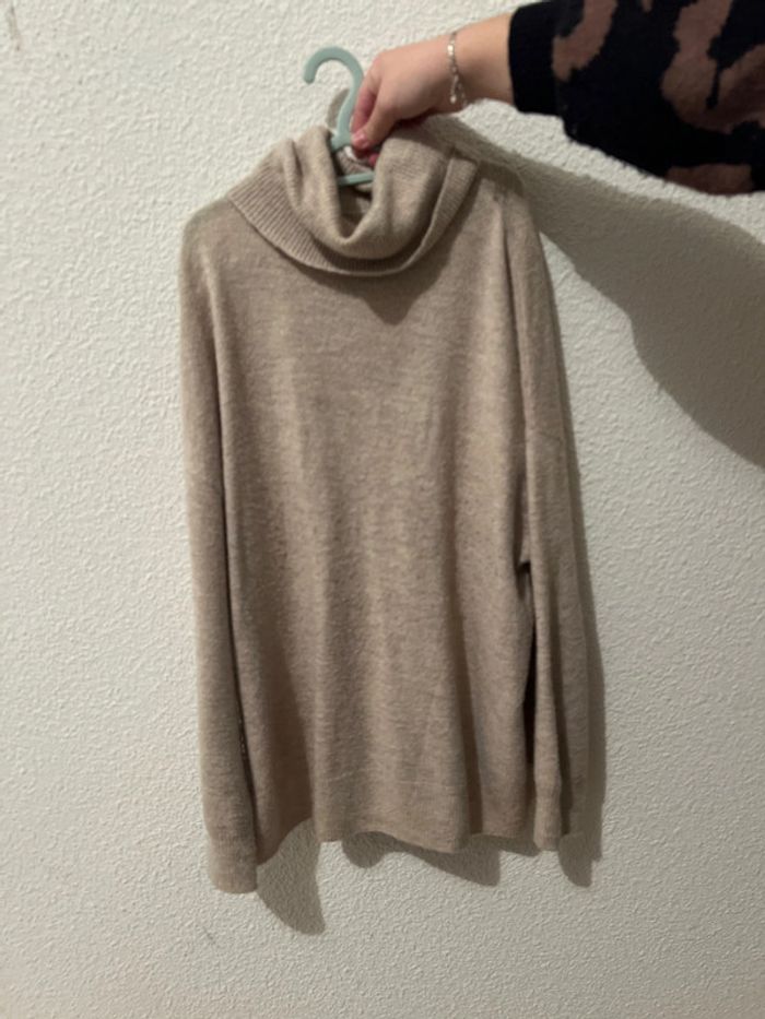 Pull col roulé