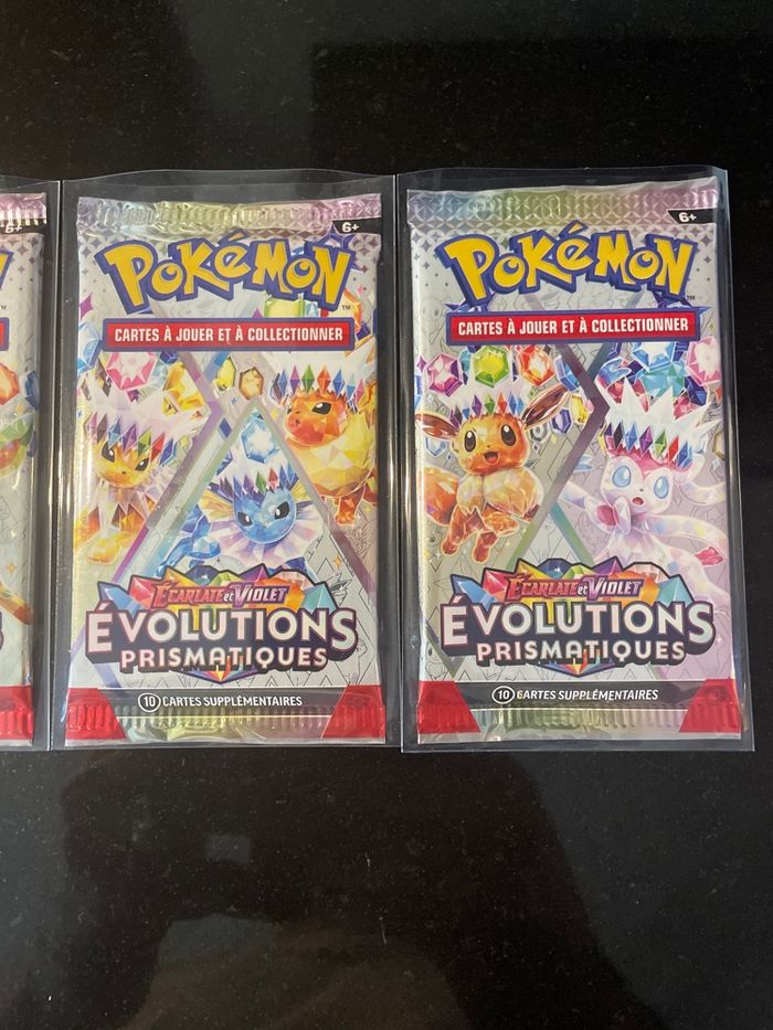 Neuf Artset 4 boosters Pokemon 8.5 évolutions prismatique - photo numéro 3