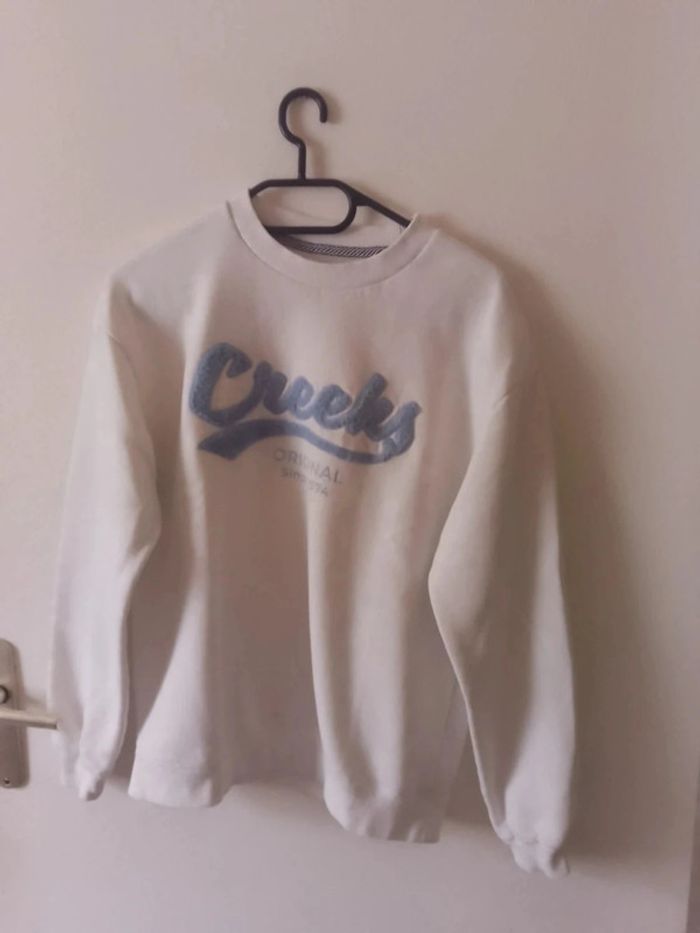 Pull taille s