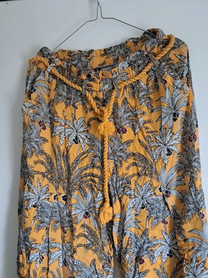 Pantalon fendue - photo numéro 2