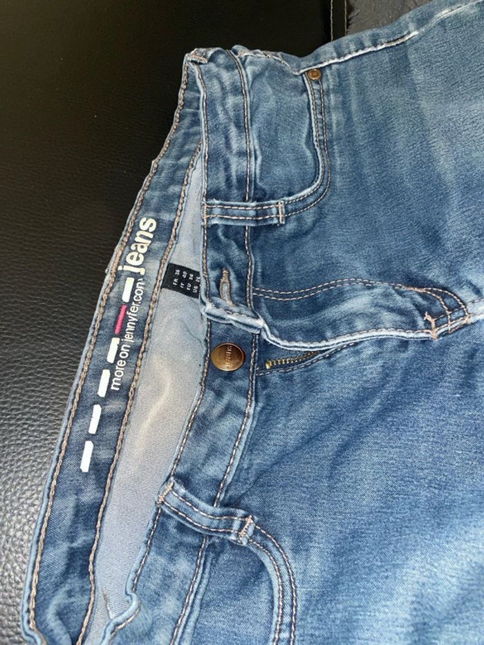 Jeans troué - photo numéro 5