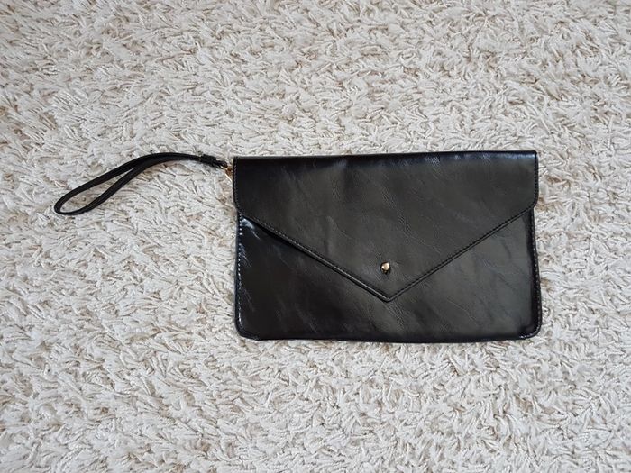 Pochette noire neuve