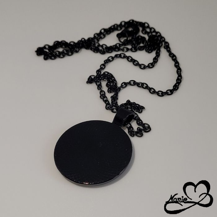 Sautoir, en acier inoxydable et en resine, noir avec des branches et des fleurs. - photo numéro 3