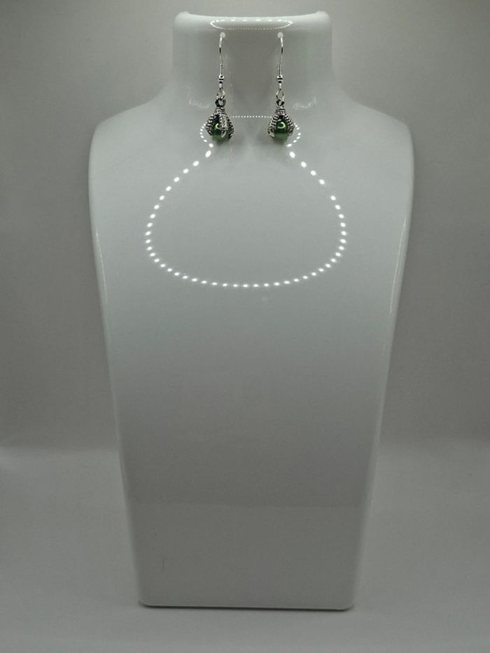 Boucle d'oreille patte de dragon