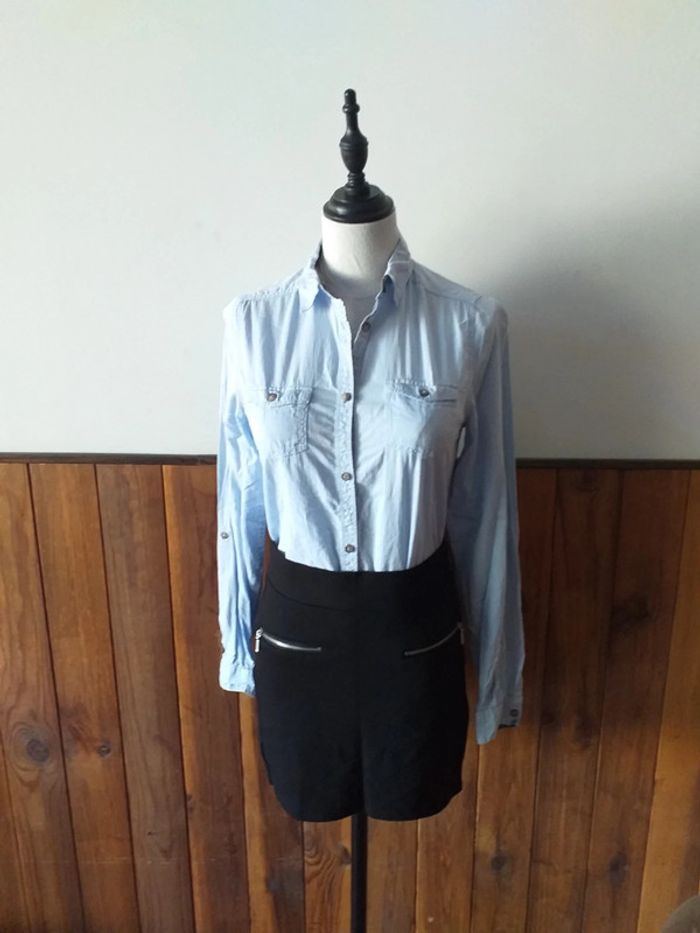 Chemise bleu avec poches