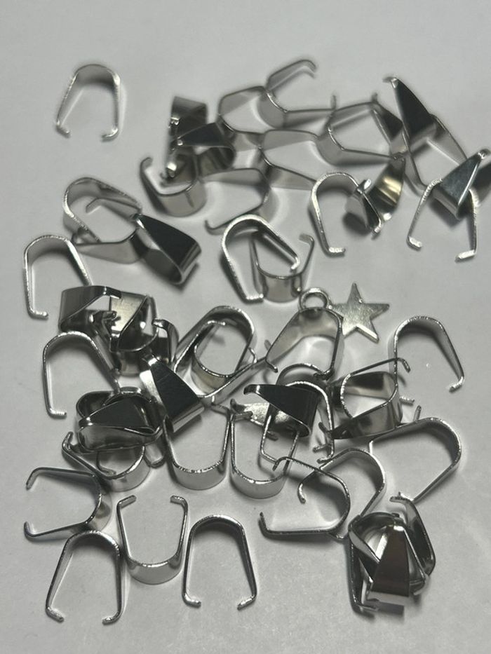 A786, lot bélières argentées en vrac