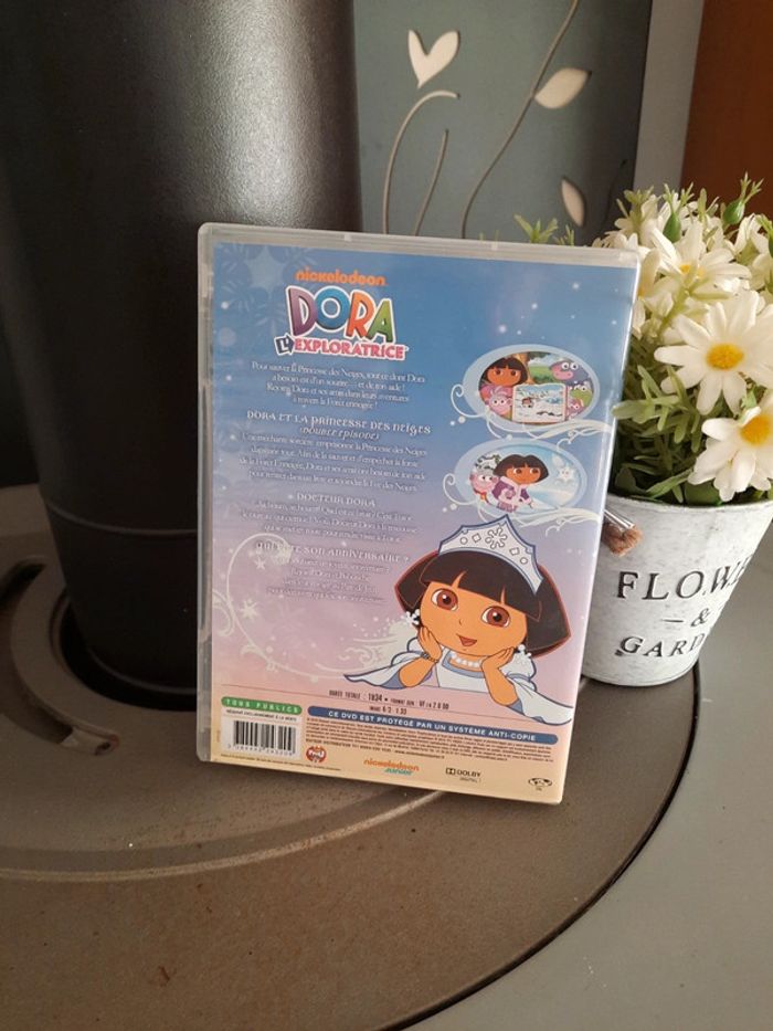 Dvd dora princesse des neiges état neuf - photo numéro 2
