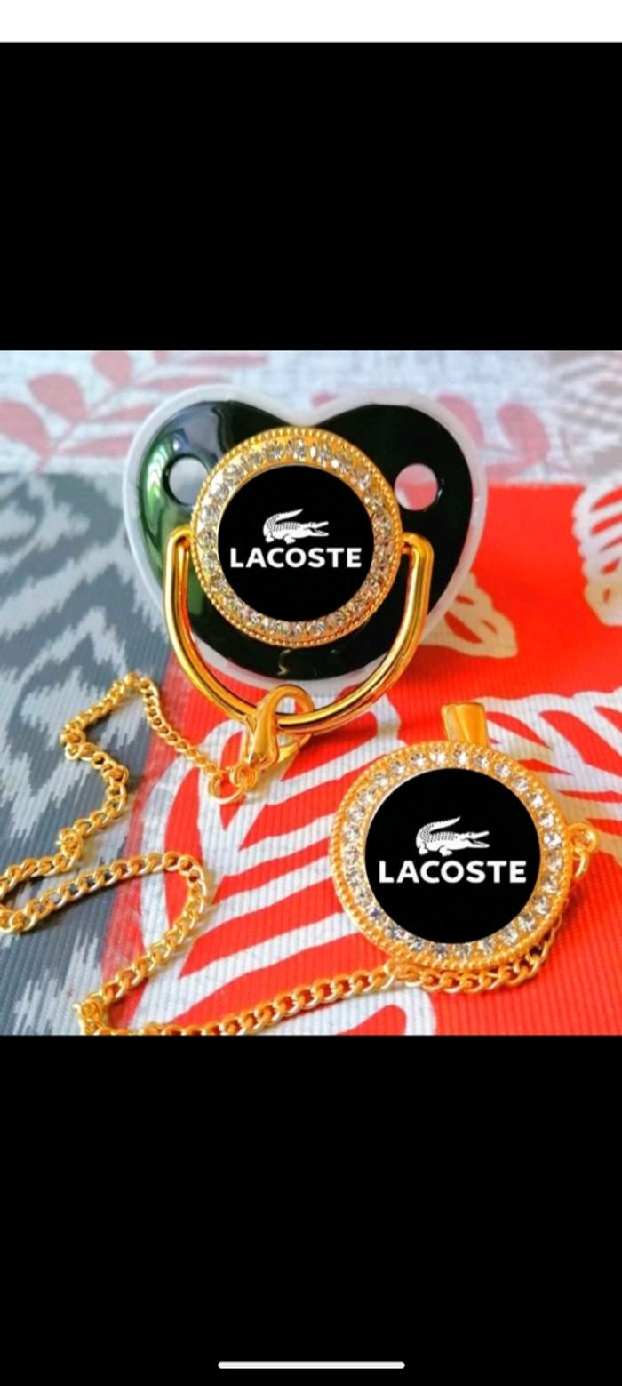 Tétine noir Lacoste - photo numéro 2
