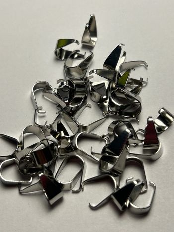 A559, lot bélières argentées en vrac