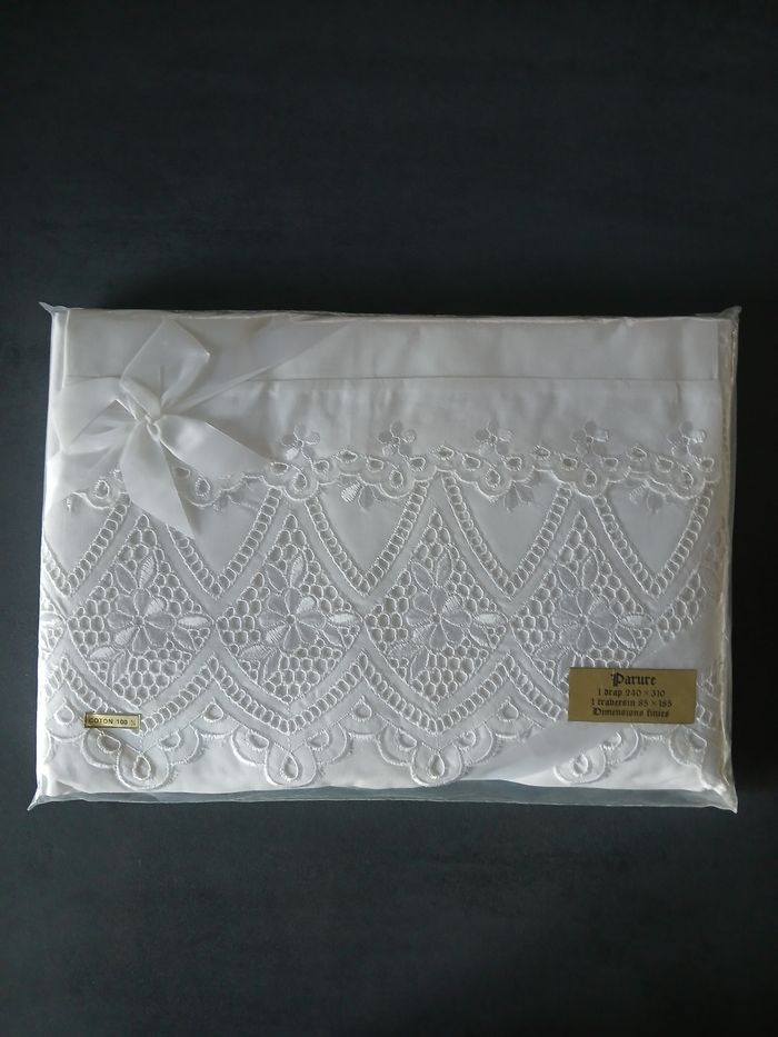 Drap  + taie de traversin 100 % coton
Neuf