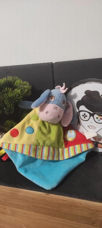 Doudou plat Bourriquet disney nicotoy Cirque cercle circus bleu vert rouge jaune éléphant