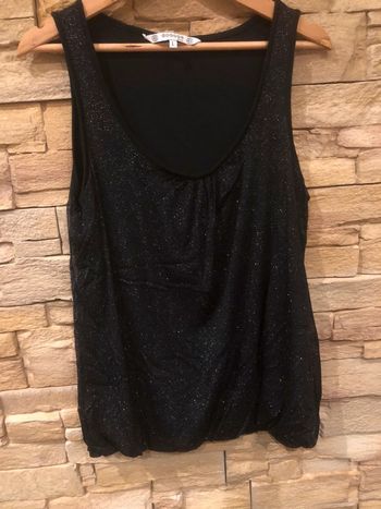 Joli haut brillant taille L