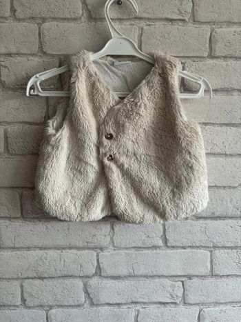 Boléro tape à l œil taille 9 mois