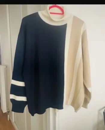 Pull  chic contenant de la laine vierge