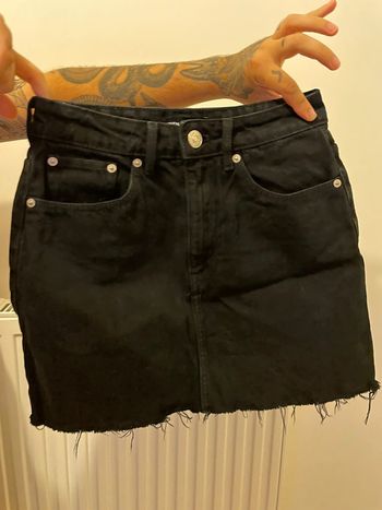 Mini-jupe en jean noir