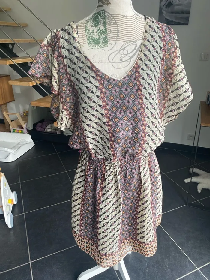 Robe cintrée demi saison.