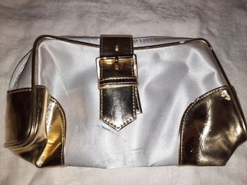 Pochette blanche et doré