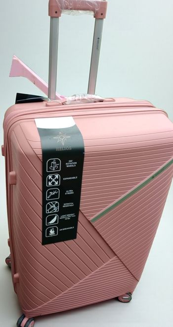 Grande valise rose pâle incassable neuve