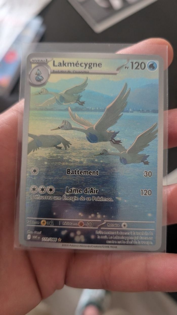 Carte pokémon de lakmecygne flamme blance