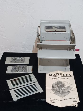 Ancienne machine à imprimer Manutex